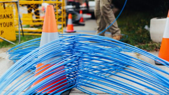 Blue fibre cable wrapped around witches hat